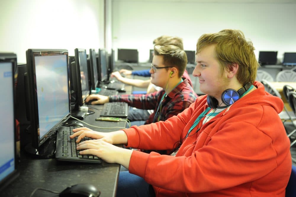 computing and emerging technologies students on the computer
