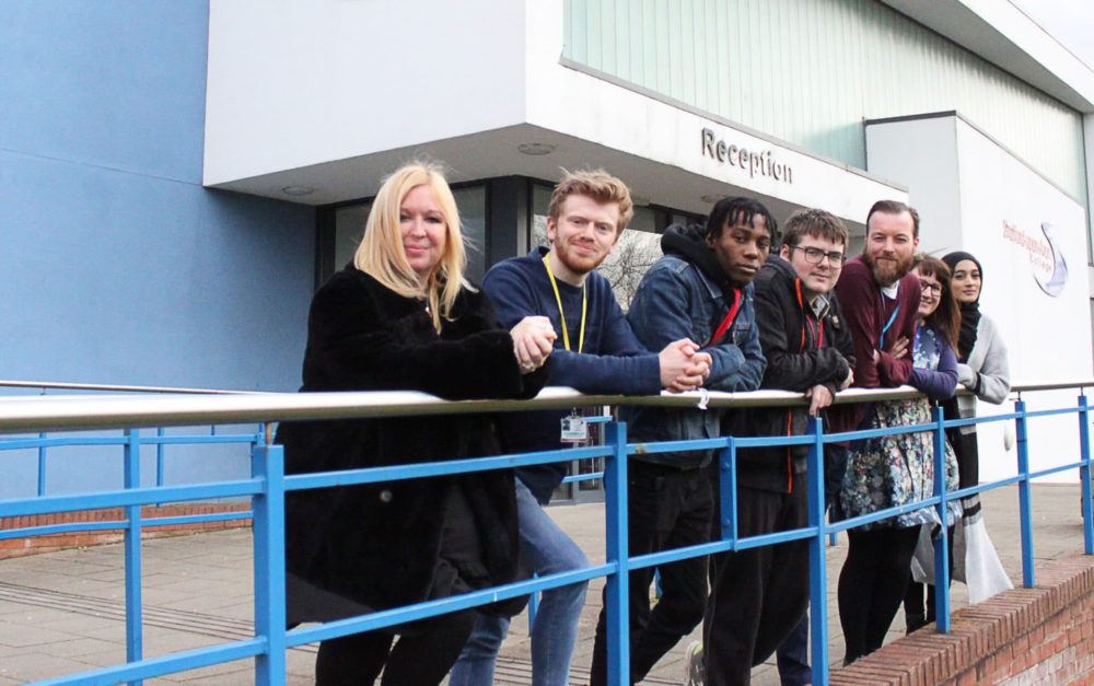 Debbie Isitt with students outside main reception