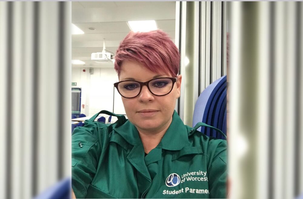 Student paramedic Deborah wearing her paramedic uniform