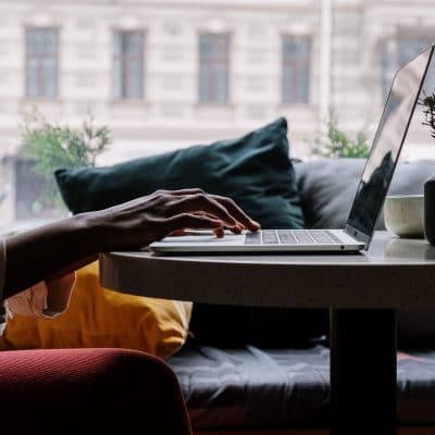 Woman typing on laptop
