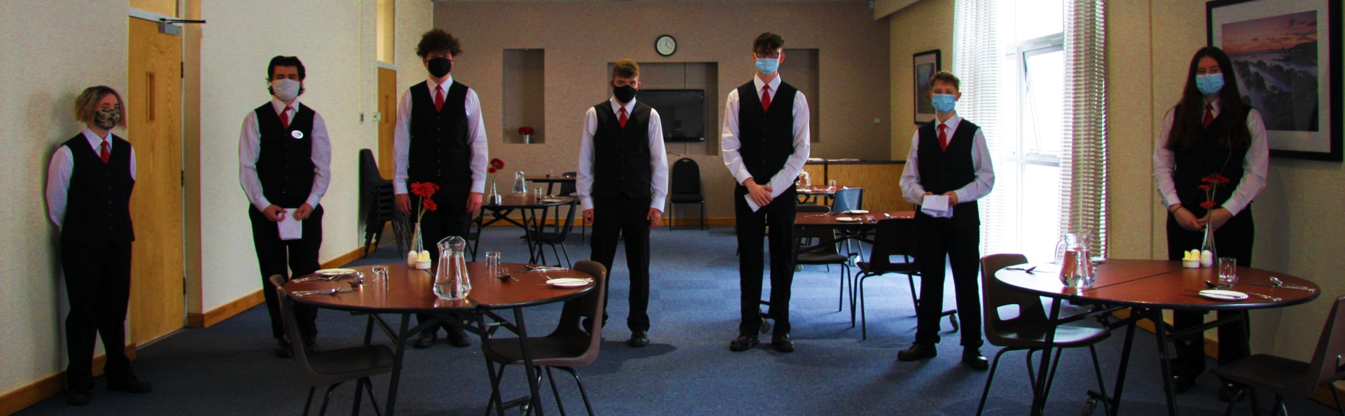 Students standing socially distanced