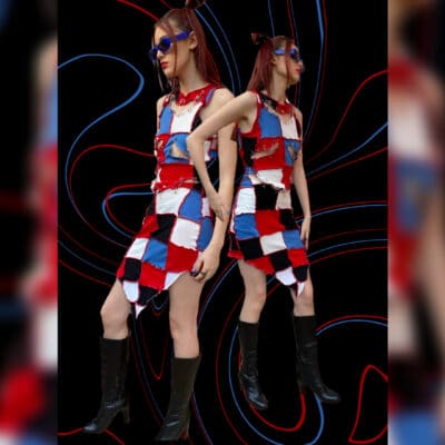 students standing wearing patchwork dress