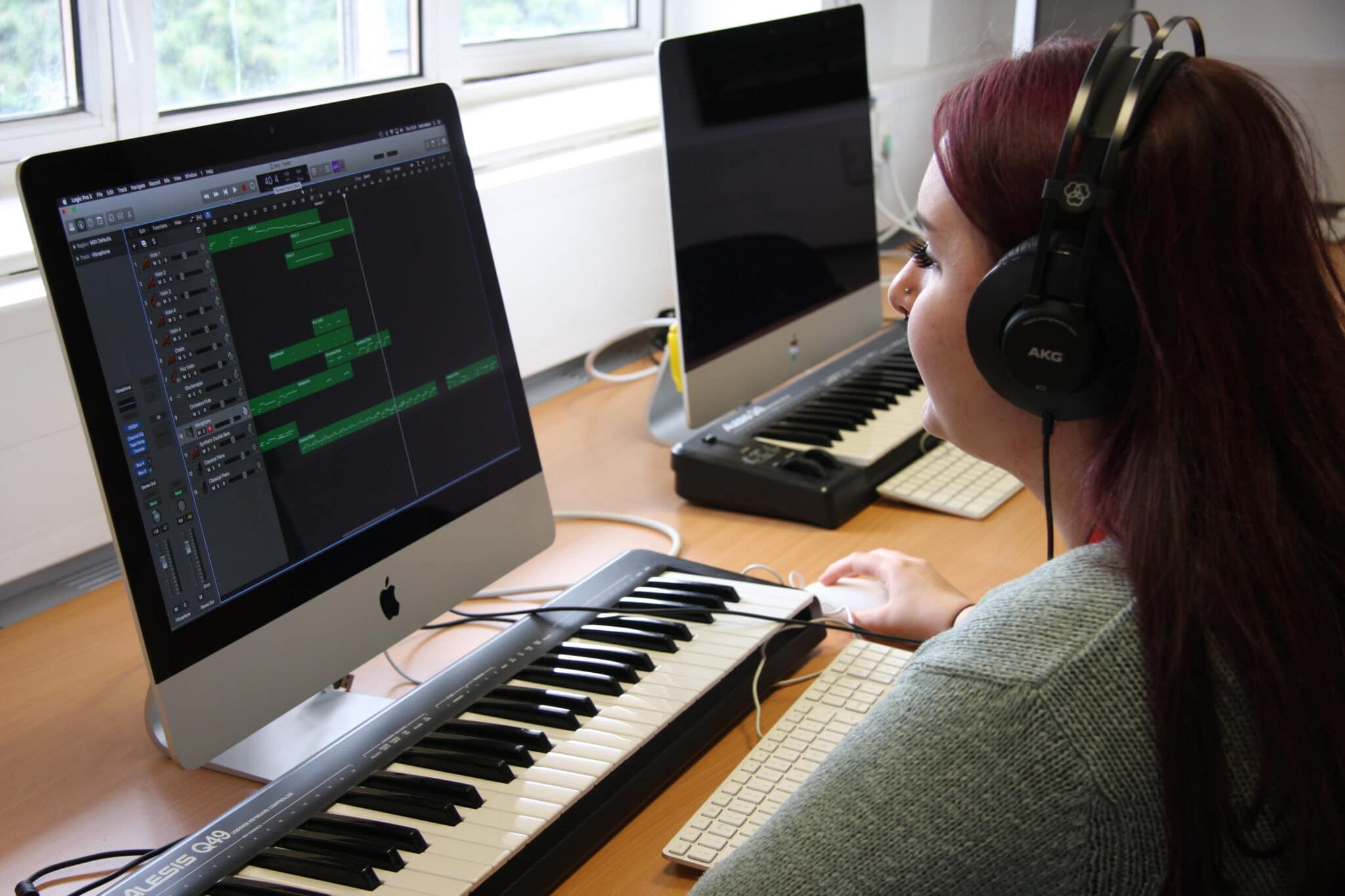 student on Mac and keyboard
