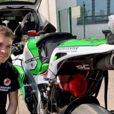 Jack next to motorbike