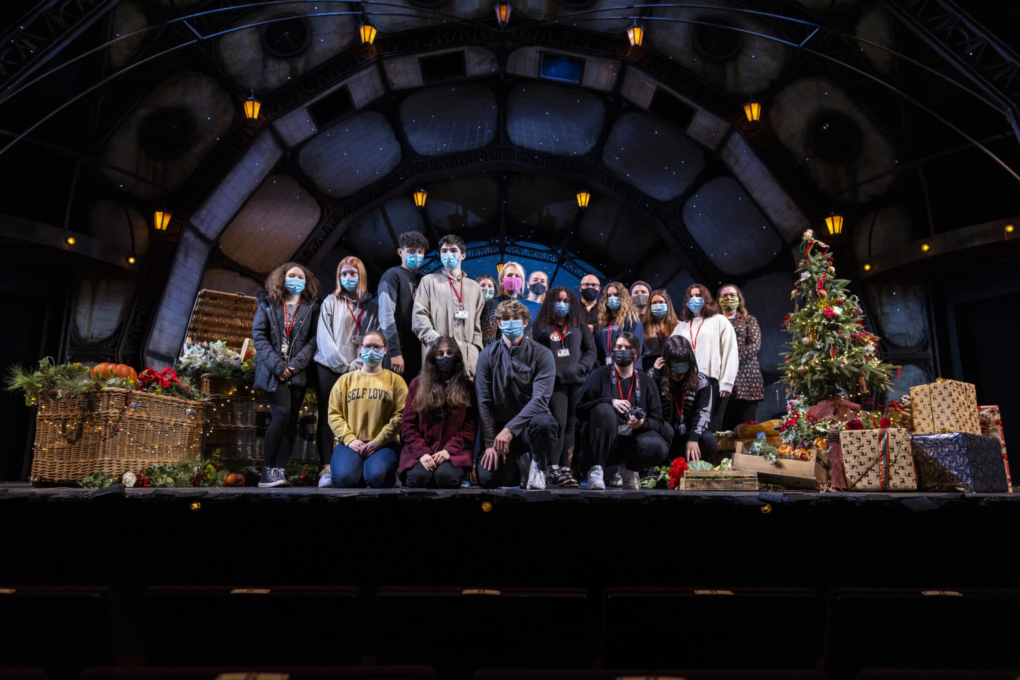 students on stage after shoot with rsc