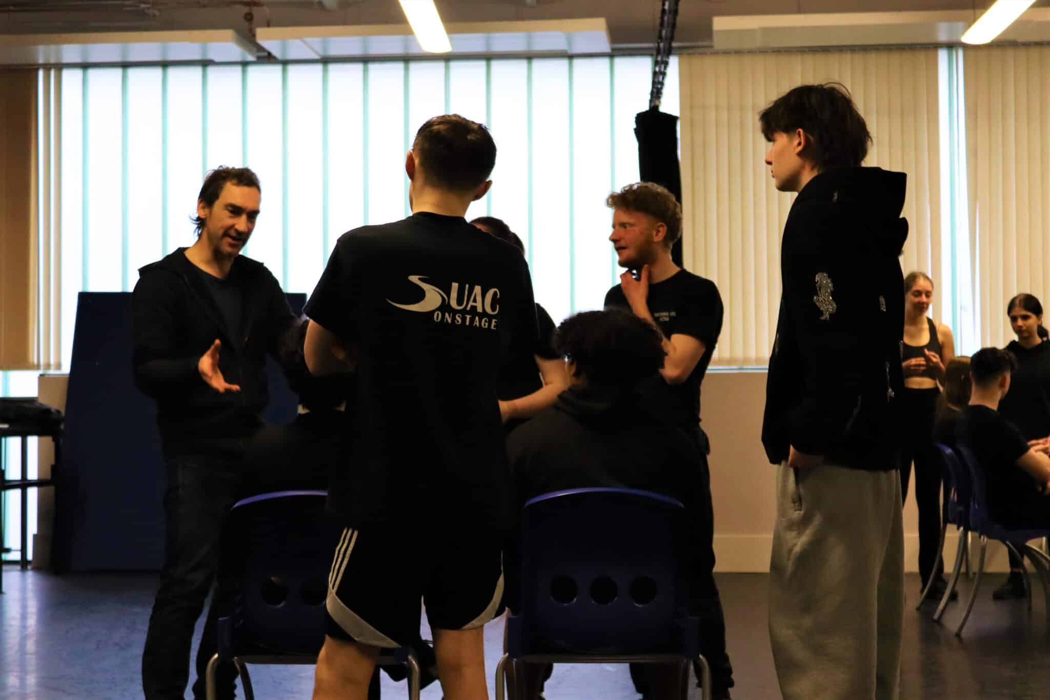 Joseph teaching students