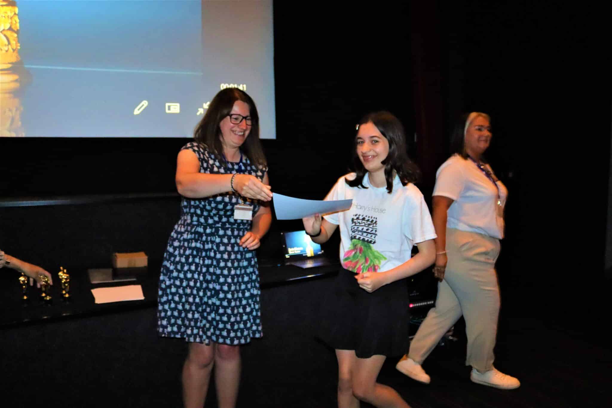 Sarah handing out award