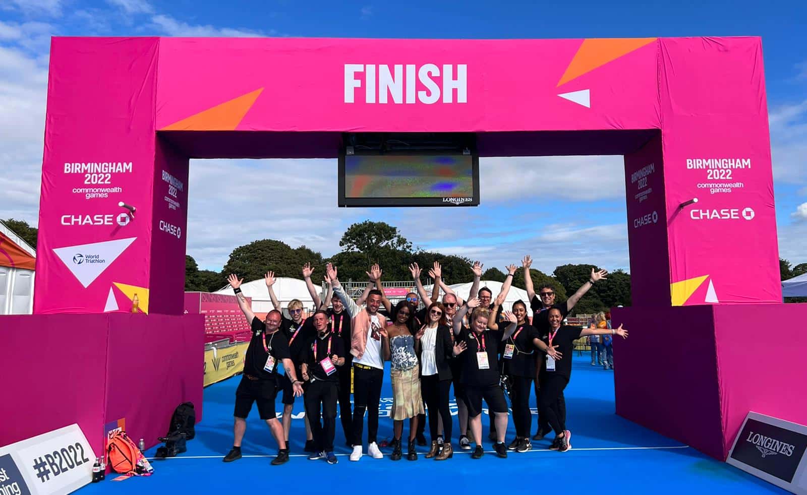 Lewis Hawkins with his team