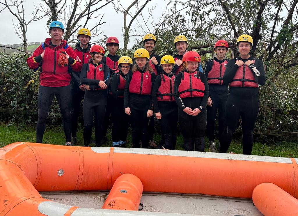 skern lodge residential - students near the boat