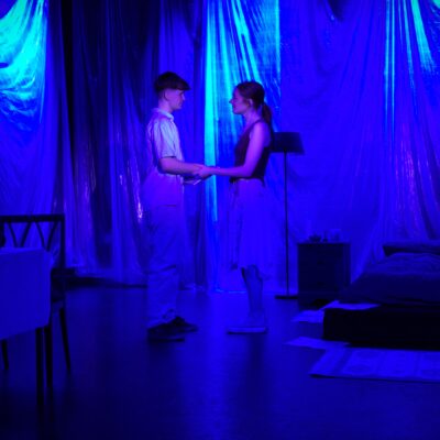 couple on stage in show