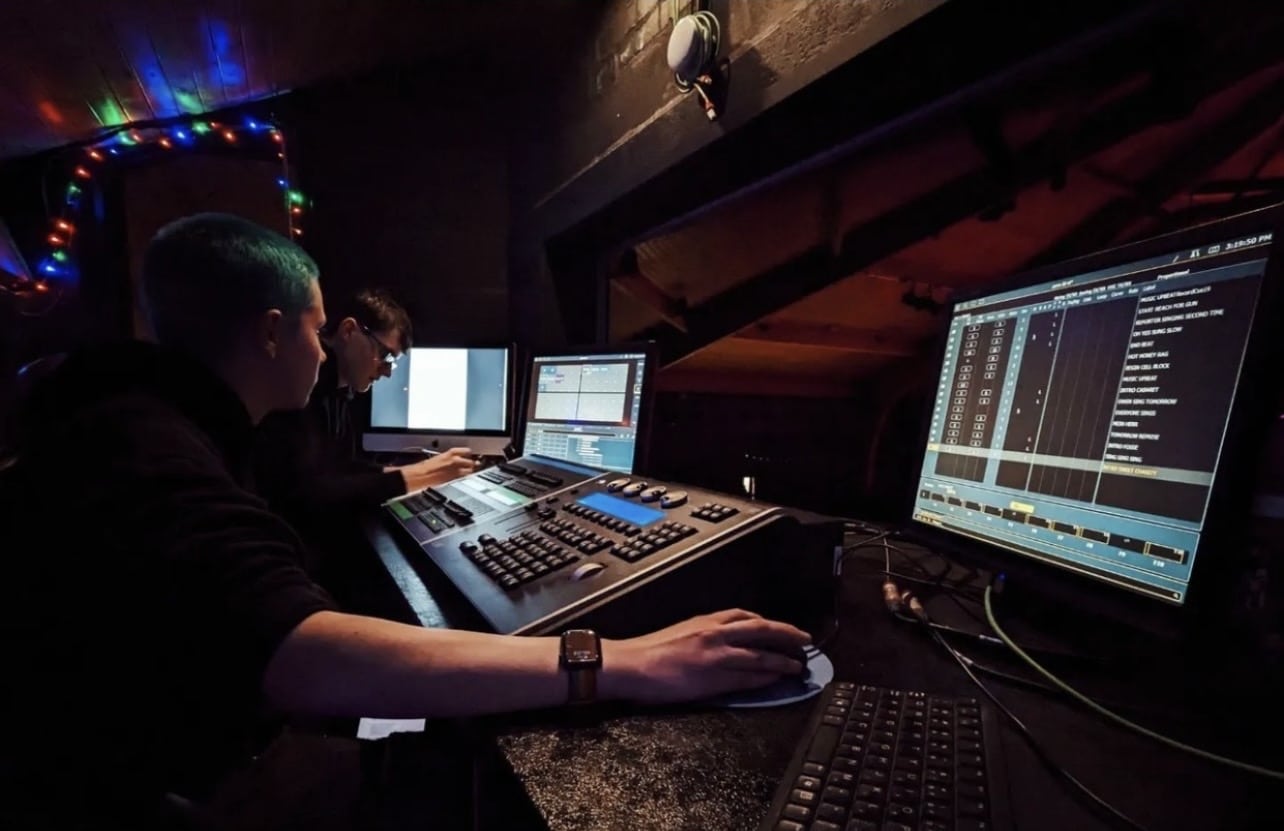 Astro working at a tech desk