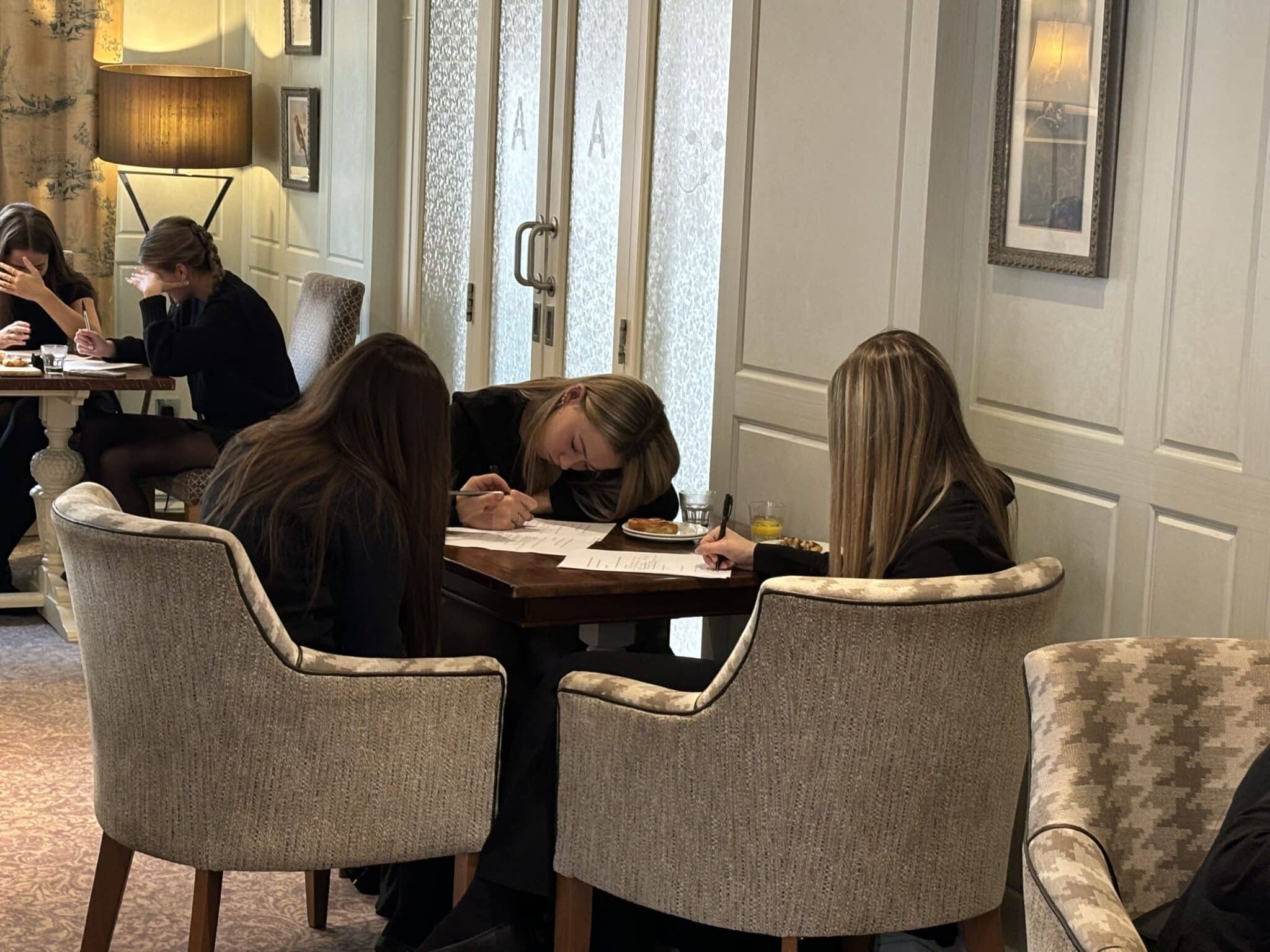 Stratford College Students working on tasks at the hotel