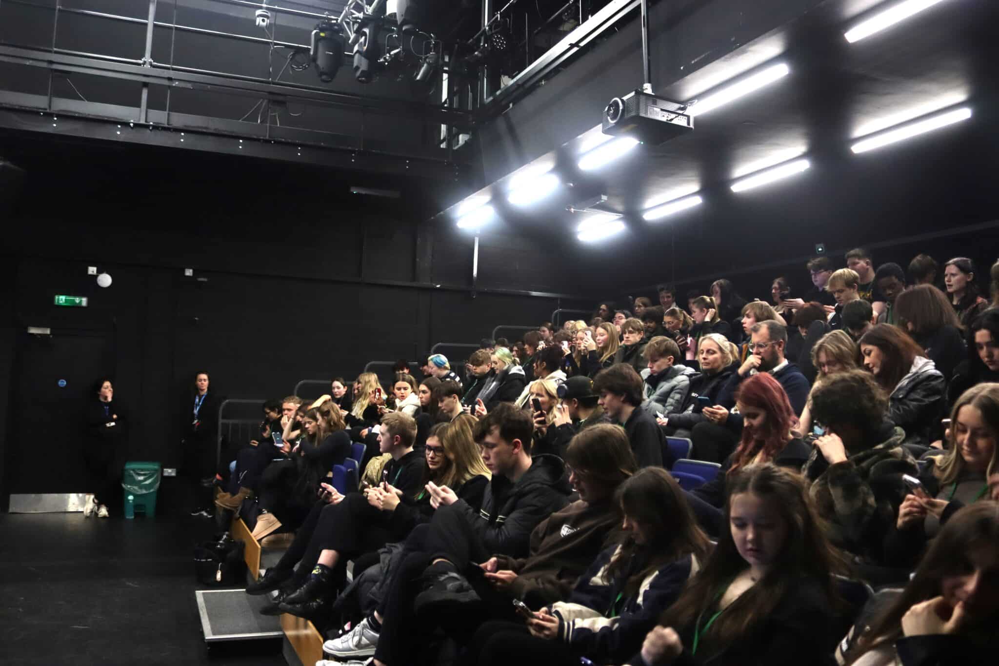 Student sat in a lecture hall