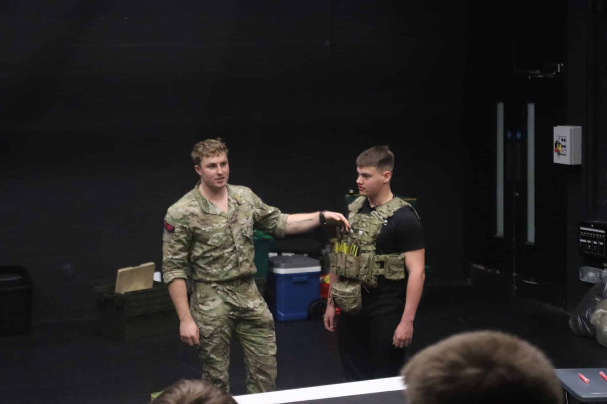Student trying on marine kit
