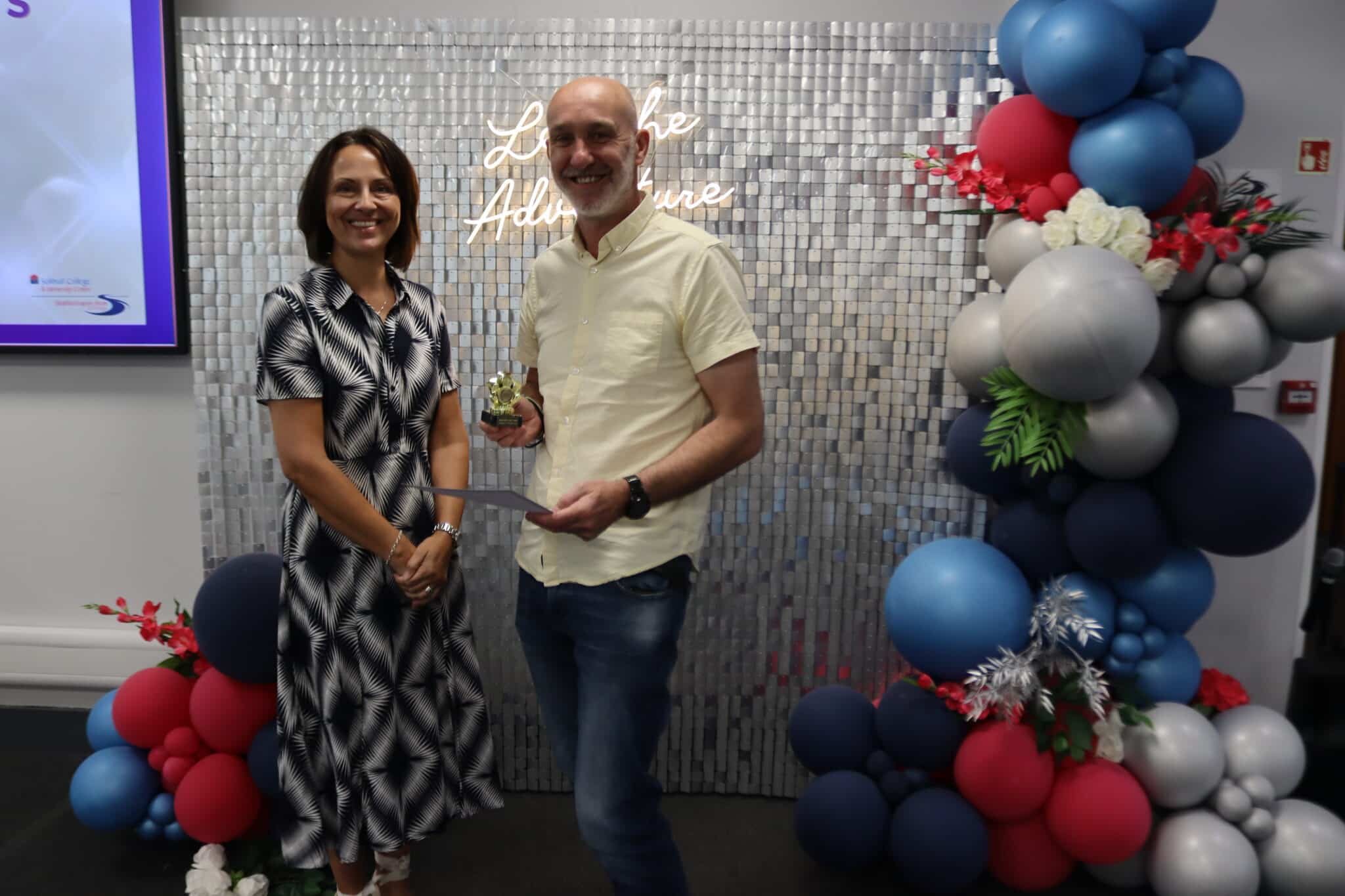 person receiving an award, smiling