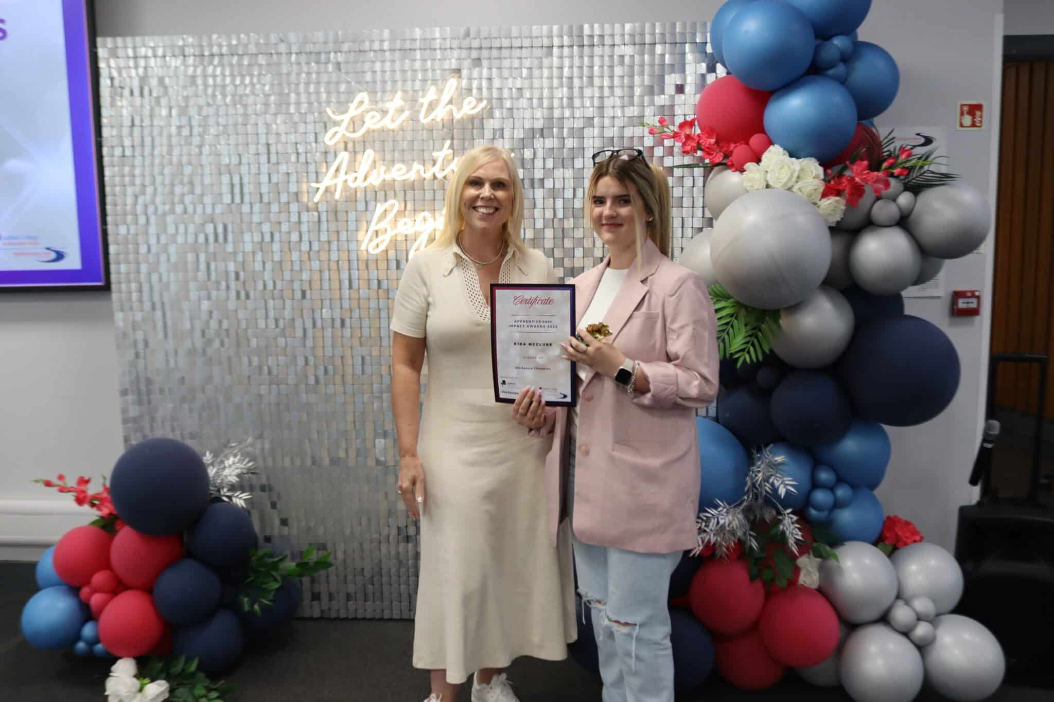 award winner and presenter with certificate