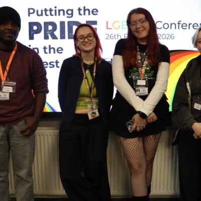 Students smiling at a camera